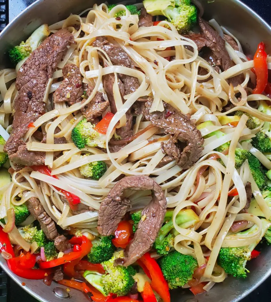 steak and vegetable stir fry with gluten free rice noodles