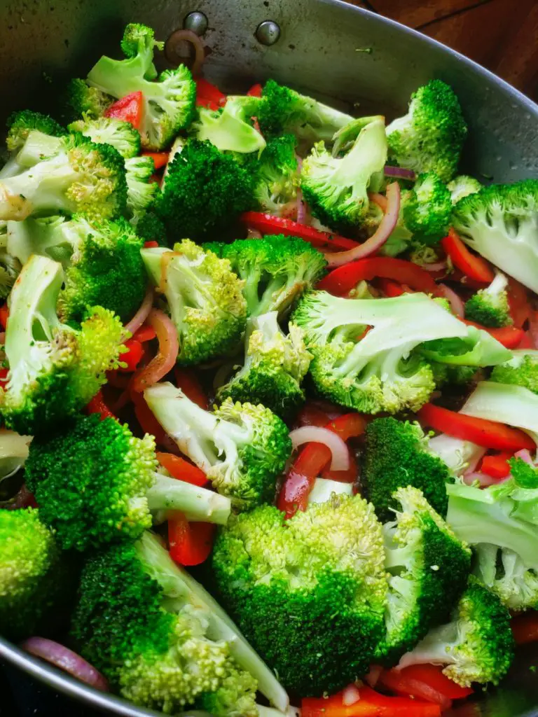 saute to cook broccoli, onion and red peppers