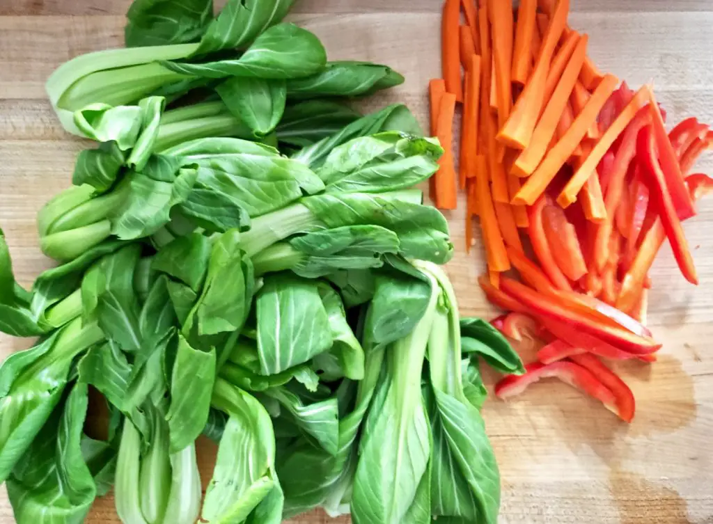 baby bok choy, carrots and red peppers