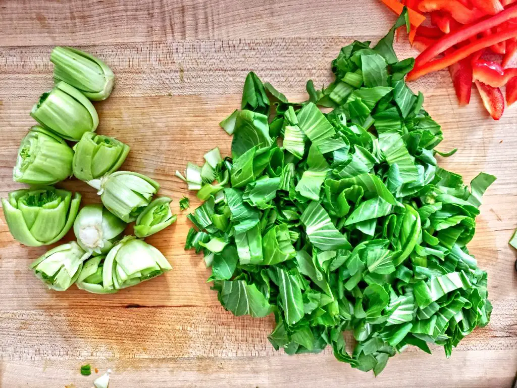 remove stems of bok choy and chop leaves