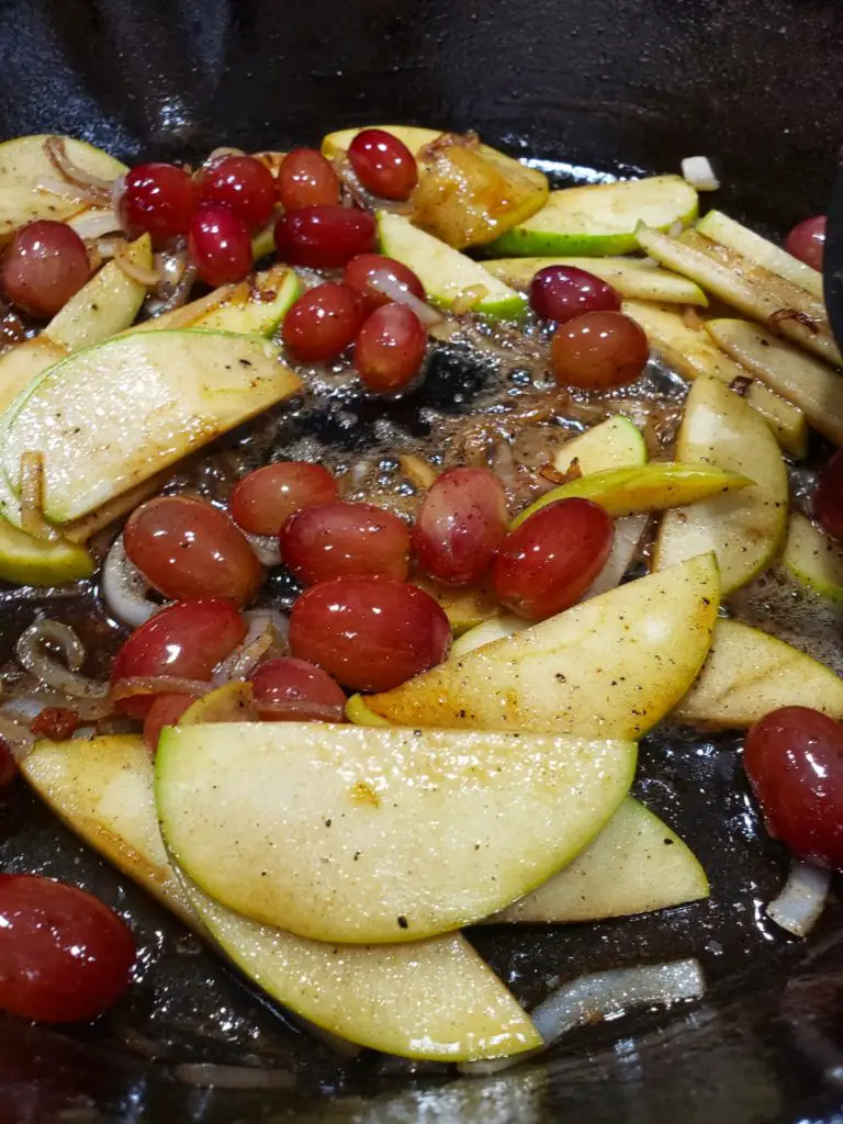 pan sear apples, red grapes and shallots in cast iron