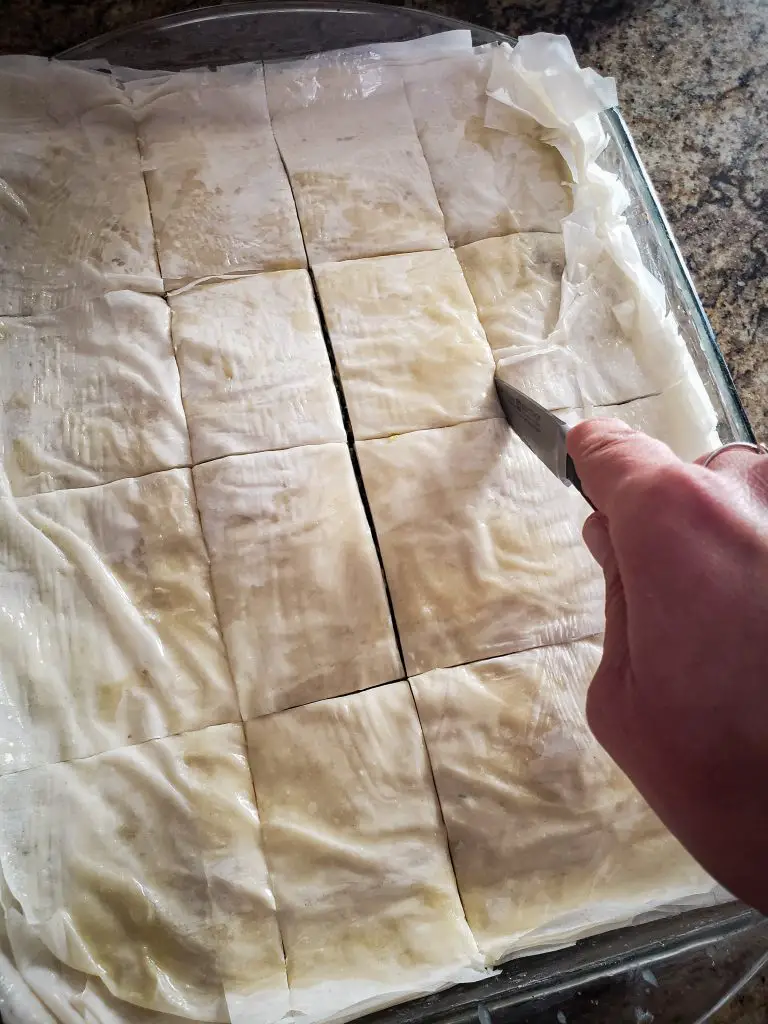 score top phyllo layer of spanakopita