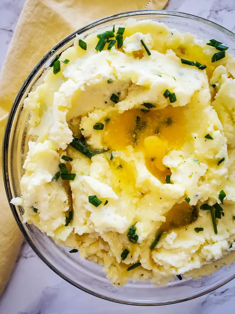 image of glass bowl of irish butter and greek yogurt mashed potatoes