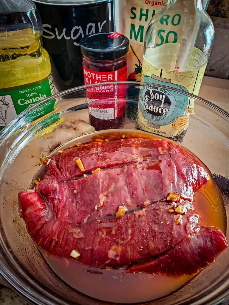 ingredients for 5 MINUTE Miso-Ginger Marinade with flank steak in mixing bowl