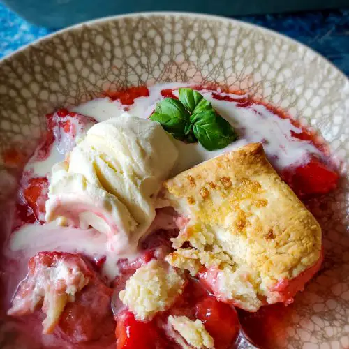 Basil & Bourbon Strawberry Cobbler with Cream Cheese Biscuits