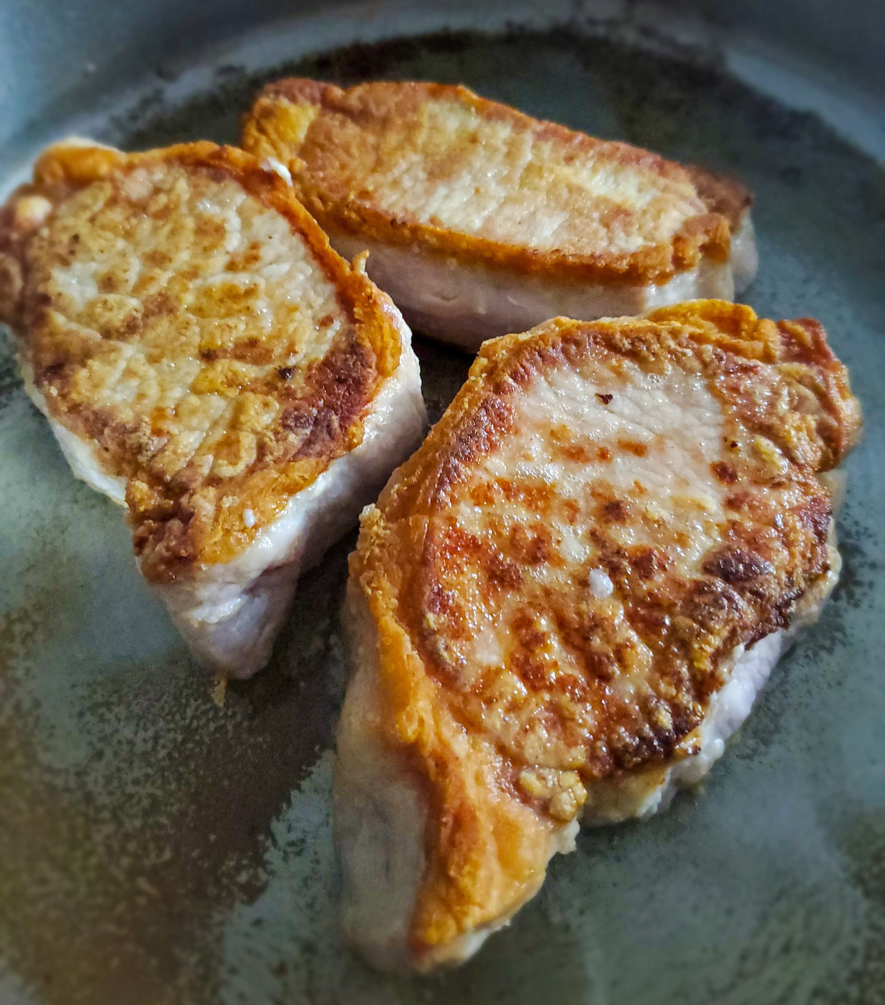 close up image of seared pork chop